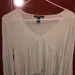 cute mint greenish top.